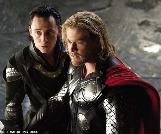 Thor what a scorcher: Tom as Loki and Chris Hemsworth as Thor in the film blockbuster