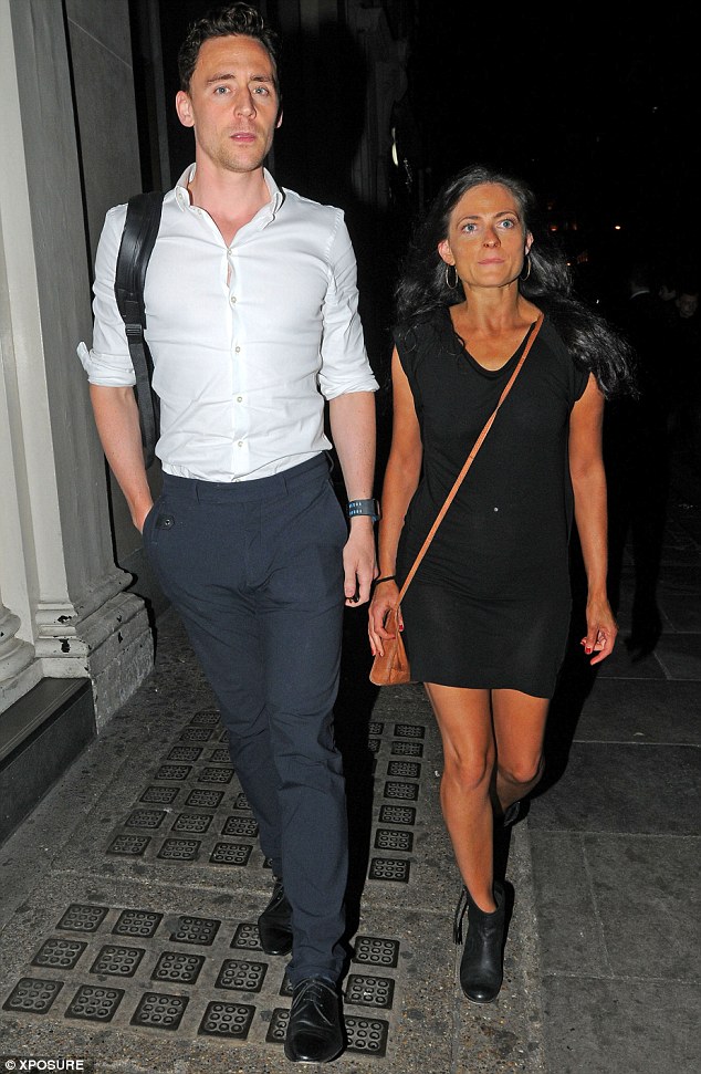 Celebrating: Hiddleston outside Nobu in London with a mystery friend where they joined Andy Murray