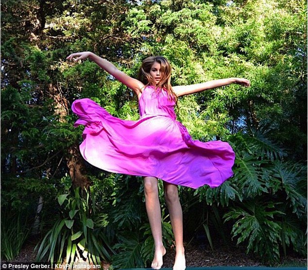 Mom-approved: Ms Crawford shared this photo of Kaia in a flowing fuchsia frock with the caption 